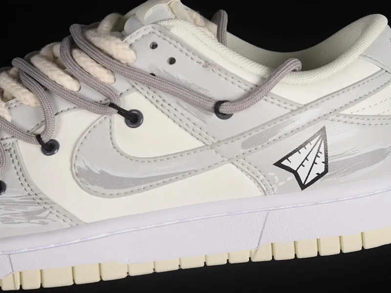 All Categories Nk SB Dunk Series Nk SB Dunk Low Low-top Sneakers Nk Dunk Low Retro "Coconut Milk" Vibe Wind Distressed Paper Plane Travel Graffiti Customized Deconstructed Strap Casual Sneakers DJ6188-100